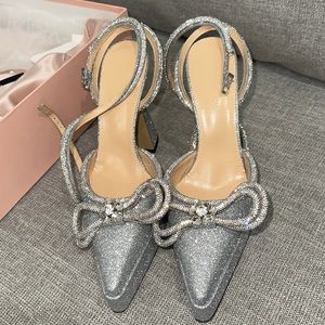 Authentic Mach and Mach silver Heels